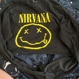 Nirvana yellow, and black, long sleeved crop top.
